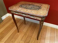 Full side view of the Italian marquetry music table showing octagonal top and legs with inlay work.