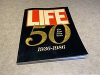 Photo of the front cover of the LIFE 50 The First Fifty Years 1936-1986 collectable book, showing the title and design clearly.