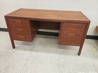 Front view showing overall desk design and condition