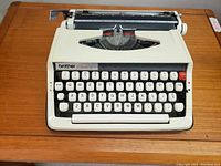 Front view of the Brother Deluxe 800T vintage typewriter showing the keyboard and body details.