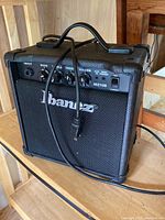 Front of the Ibanez IBZ10B amplifier showing controls and power cord.