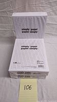 Three unopened packs of Simply Paper blank printing paper, each with 500 sheets, 20 lb weight, letter size, stacked on a neutral surface.