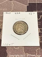 Obverse side of the 1860 Indian Head penny showing the Indian Head profile design and date.