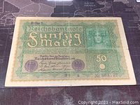 Front view of 1919 German 50 Mark banknote showing overall design and condition.