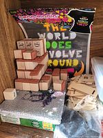 Wooden number and letter stamps and craft stickers including neonmania sheets.