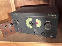 Front angled view of the Hallicrafters S-38B radio receiver showing controls, dials, and front panel layout.