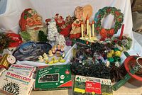 Wide shot showing full lot arrangement of vintage Christmas decorations and lights for sale