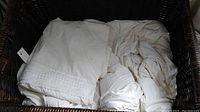 Queen size white duvet and duvet cover in woven dark brown decorative box