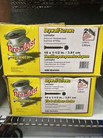 Two yellow Pro-Twist branded cardboard boxes labeled as drywall screws, each with 5,000 screws plus 2 free screws per pack, size 10 x 1-1/2 inch (3.81 cm) laminator screws, phosphate coated and bugle head.