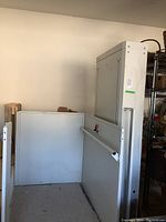 Overall view of the lift showing platform and vertical mast.