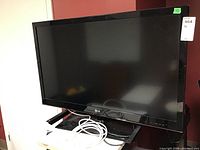 Front view of LG flat-screen television with stand