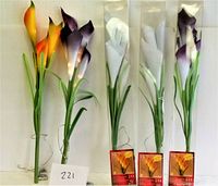 Five LED lilies in standing position; two purple, two white, one yellow, all about 24 inches tall with LED lighting.