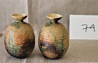 Pair of ovoid vases with narrow necks, side view
