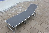 Chaise lounge chair fully assembled and set up to show adjustable backrest and overall condition.