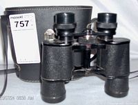 Skyline binoculars in front of carrying case