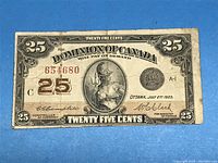Front of the 1923 Dominion of Canada 25 cents shinplaster paper money