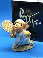Pendelfin rabbit figurine with tennis racket and ball, original packaging in background