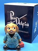 Front view of the Pendelfin Mike rabbit figurine with box in the background.