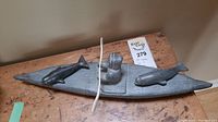 Top-down view of entire sculpture on wooden surface