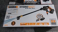 Worx HydroShot power washer box front with product image and details showing 320 PSI and various usage icons