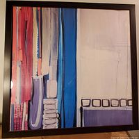Close-up view highlighting the abstract artwork details and black frame with scratches.