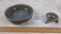 Two vintage Wade Irish porcelain bowls placed next to a ruler showing size, with a MaxSold auction card numbered 174.