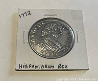 Front side of coin displaying King Carlos III profile with inscription and date 1772 in white card holder labeled 'HISPANIARUM REX'