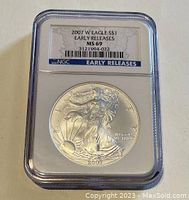 Front view of the 2007 W American Silver Eagle 1 oz coin graded MS69 Early Releases by NGC showing detailed design and certification label.