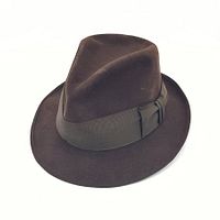 Top side view of vintage brown felt fedora hat showing black grosgrain band and bow detail.