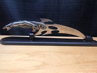 Side view of the entire mini display sword on its black display stand.