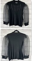 Front and back photos of the black 89th + Madison long sleeve dress top with silver bead embellishments and sheer puff sleeves.