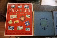 Traveler Stamp Album with red cover showing various postage stamps and compass rose graphic