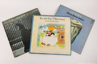 Three vinyl LP records showing Neil Young's After The Goldrush, Cat Stevens' Tea for the Tillerman, and Cat Stevens' Mona Bone Jakon albums.