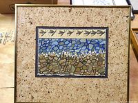 Framed watercolor painting showing full artwork with cork-board mat