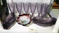Full set showing 7 amethyst soda fountain glasses, 6 banana split bowls, and single art glass bowl