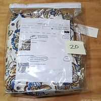 Supima cotton duvet and pillow case set sealed in clear plastic bag with printed purchase details visible