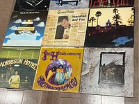 Close-up photo focusing on Tom Waits, The Moody Blues, Jimi Hendrix Experience and The Doors album covers among others.