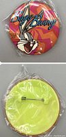 Photo showing front and back of the pin with Bugs Bunny design and yellow back, packaged in clear plastic.