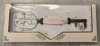 Front view of the Disney Princess collector key in original box.