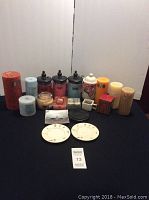 Overview of all candles and plates showing quantity, sizes, and arrangement