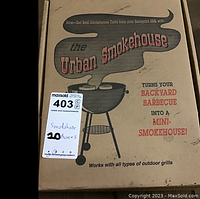 Cardboard box labeled Urban Smokehouse for outdoor grills, indicating 10 boxes to be pulled off pallet.