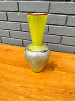 Full side view of the vintage MCM art glass vase showing yellow and silver/grey cracked glass patterns with black lines and red rim.