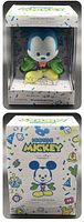 Front and back view of the Disney Iconic Mickey vinyl figure box showing the figure inside and the colorful packaging design.