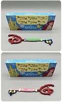 Two photos showing the Disney The Little Mermaid Ariel Collector Key and its original box. The key features a red 'D' handle with two decorative sides depicting Ariel in mermaid and human forms.