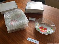 Set of 4 deep glass plates with floral painting in original packaging with box and bubble wrap