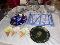 Full view of all items including glass punch bowl, cake dome, bamboo ceramic tray, ice cream dishes, and decorative plates.