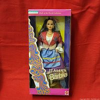 Front view of boxed Italian Barbie doll showing traditional costume and packaging design.