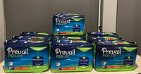 Photo shows ten identical bags of Prevail Per-Fit Daily Underwear stacked in two rows. Each bag is labeled as containing 20 medium size underwear with sizes 34-46.