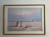 Full view of framed oil painting showing beach landscape with figures, lighthouse and sailboats.