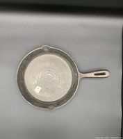 Top view of cast iron frying pan showing interior surface and overall shape